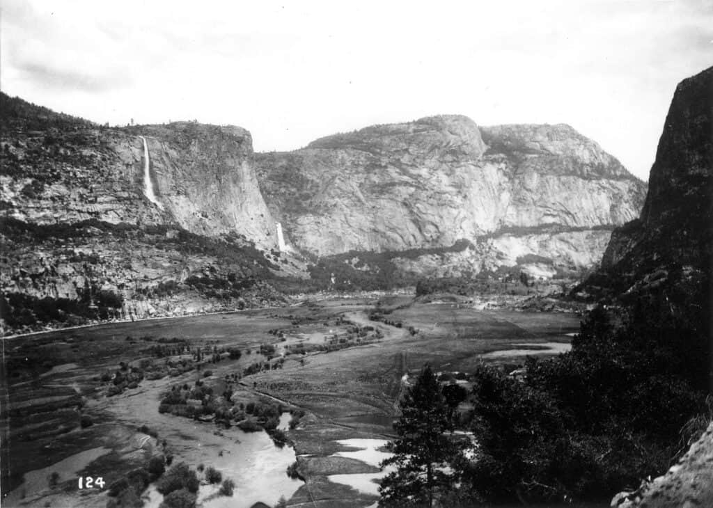 A back and white photograph of Hetch Hetchy valley before the dam.