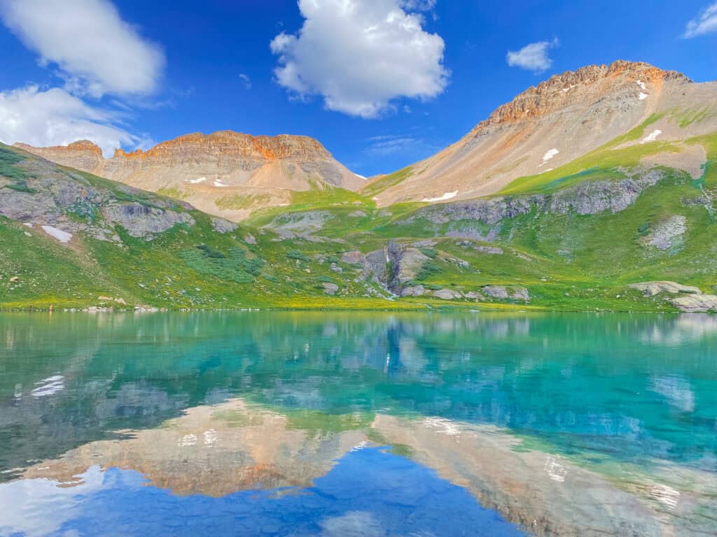 stunning blue lake and colorful mountains at Ice Lake in Colorado
