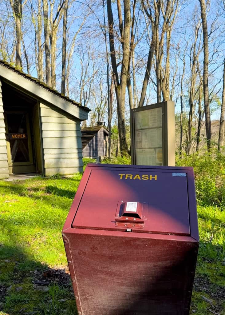 bear-proof trash cans and vault toilets at every shelter site